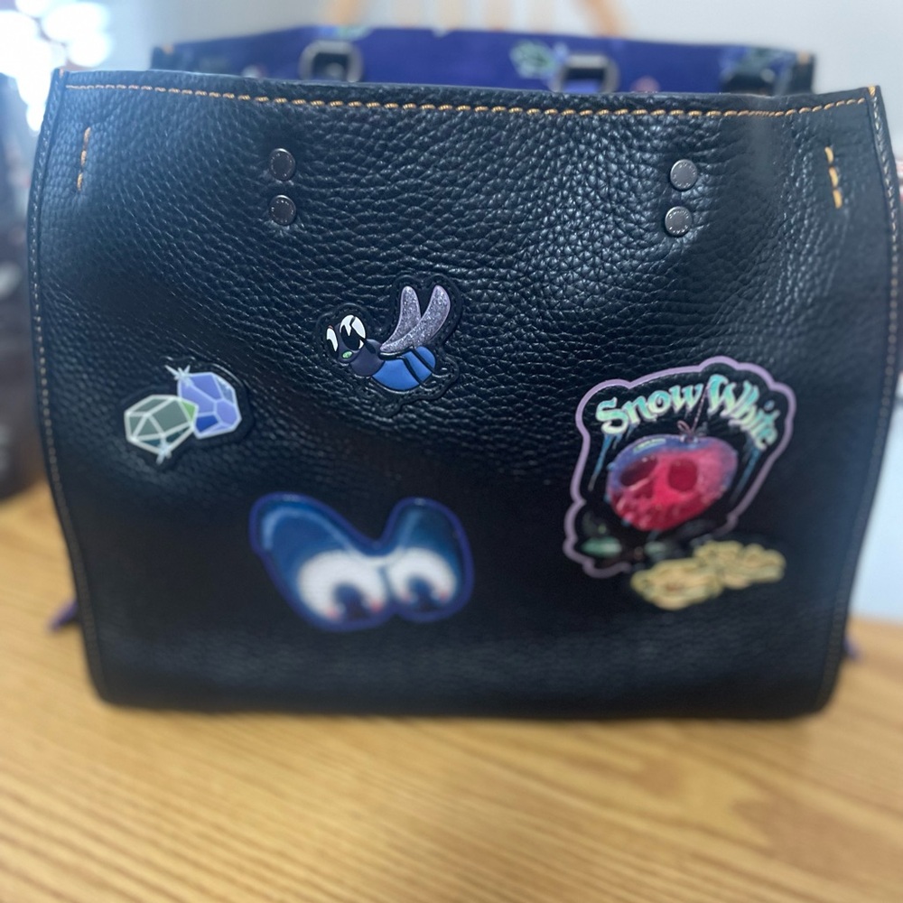 Coach x Disney Dark Fairytale blk/purple